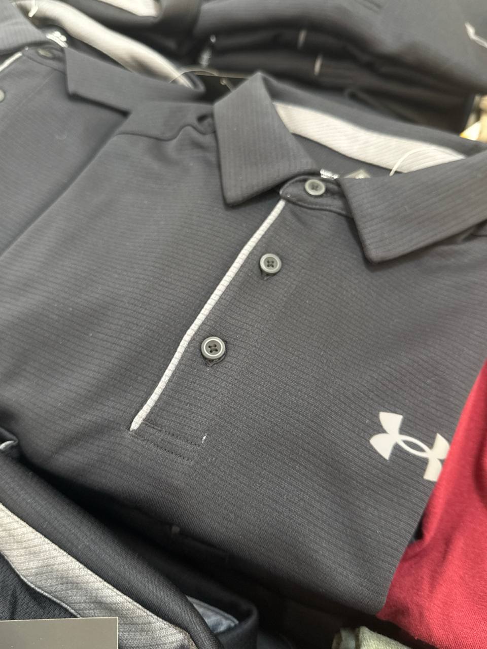   camiseta polo UNDER ARMOUR