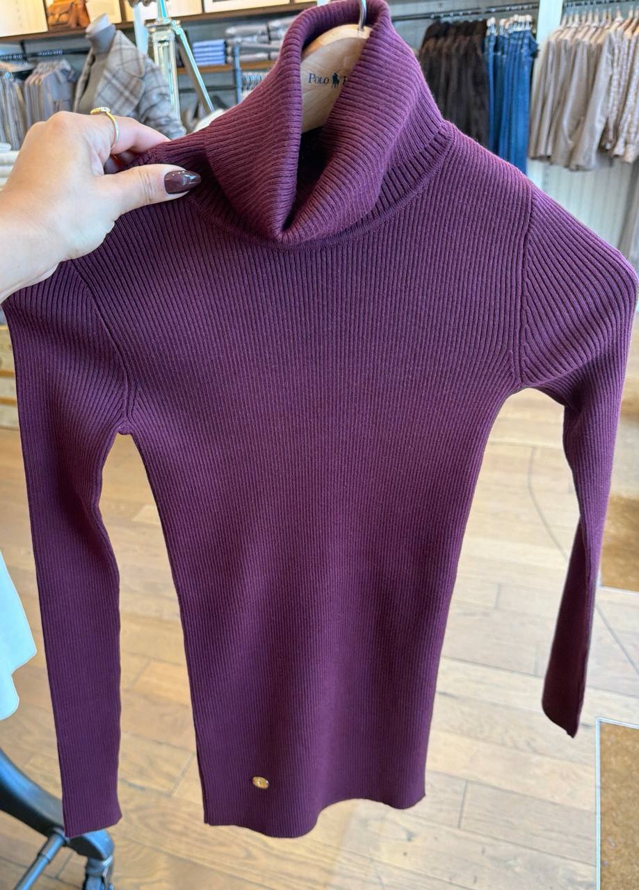Blusa de linha gola alta