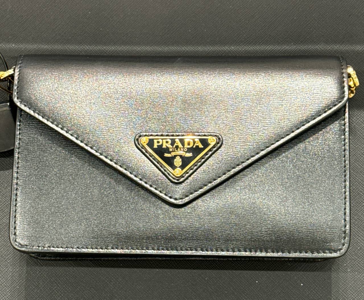 CROSSBODY pequena com alca em correntes