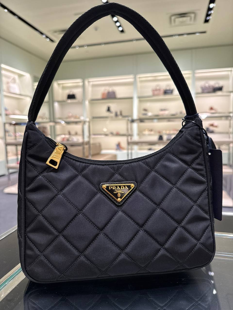 material da bolsa nylon  nao acompanha alça transversal