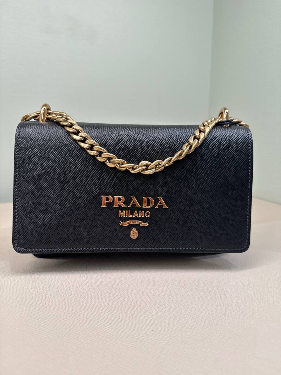 material da bolsa nylon  com alca em corrente CROSSBODY