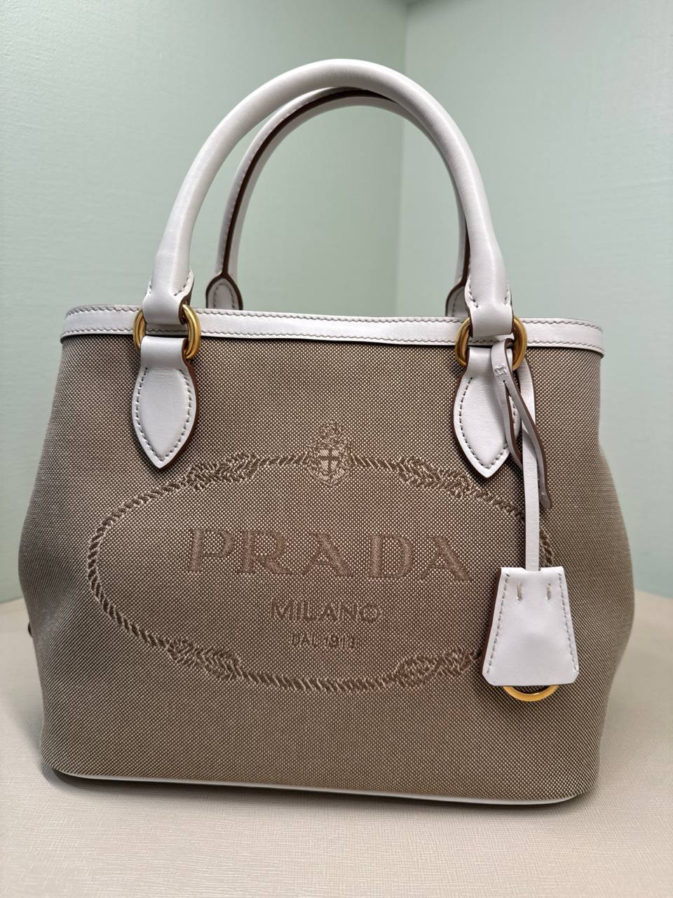 material da bolsa pano com alça transversal em couro