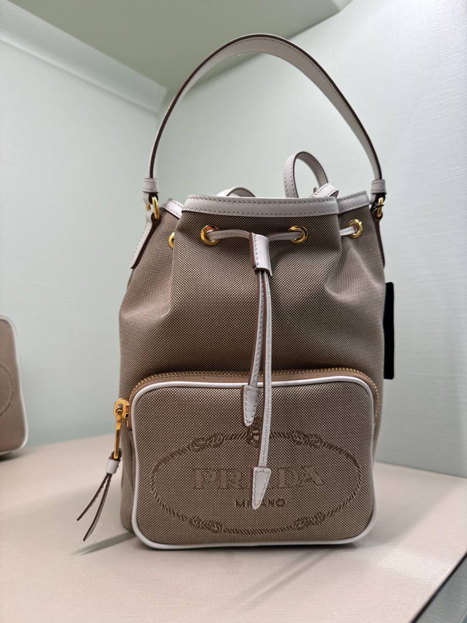 material da bolsa pano acompanha alça transversal em couro